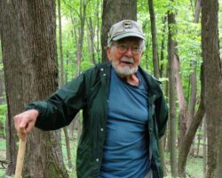 Germain at McGilvra Woods State Natural Area, a maple-basswood forest he helped protect in the Baraboo Hills in Sauk County, WI. Photo courtesy of WI DNR.