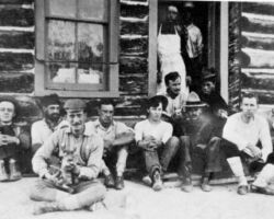 Griffith (holding pet fawn) and Black Hills crew. 1901. Photo from E. M. Griffith and the Early Story of Wisconsin Forestry (1903-1915) publication, WDNR.