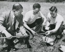 Fred Schmeeckle taking soil samples with students. Circa 1950-1955.