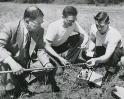 Fred Schmeeckle taking soil samples with students. Circa 1950-1955.