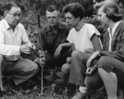Fred Schmeeckle explains the use of a soil auger to 3 of 45 teachers who enrolled in an annual 5-week conservation workshop at Trees for Tomorrow. 1955. Photo courtesy of Trees for Tomorrow.