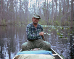Johnson traveled throughout the U.S. to hunt and fish. In 1973, he canoed in the Okefenokee Swamp in Georgia. Photo courtesy of Douglas Johnson.