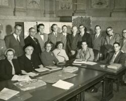 Fred Schmeeckle, sitting second from right. Photo courtesy of Wisconsin DNR.