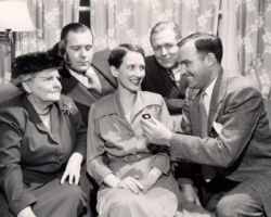 Schmitt was presented the Broughton Award by Larry Hautz. Present was WCHF Inductee Pearl Pohl. 1950.