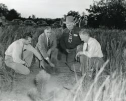 L-R: Fred Dalms, Landcaster Grant County Agent; Fred Trenk, UW Extension Forester; Al Kratochwil, WI River Valley Reforestation Project; Carl Haas, landowner. 1951. Photo courtesy of WI Department of Natural Resources.