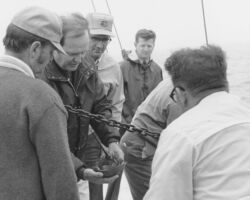 Governor of Delaware, Russell Peterson holding a horseshoe crab. 1971. Photo courtesy of Deleware Public Archives.
