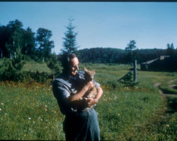 Robert Ellarson with a timberwolf cub in Ontario's Algonquin Park.