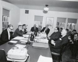 Conservation Commission meeting at Poynette, in the Conservation Education Center, to accept donation of money from Wetland for Wildlife. Left to right: James R. Smaby, La Crosse; Paul J. Olson, Madison; Charles F. Smith, Wausau; Guido Rahr, Manitowoc, chairman; Conservation Department Director Lester P. Voigt; John Lynch, Gordon, secretary; Jack J. Schumacher, Shawano. 1961. (Photo by Dean Tvedt. Courtesy of UW-Madison Digital Archives.)
