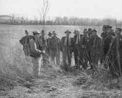 Robert McCabe speaking to Wisconsin Conservation Department Staff. 1953. Photo courtesty of UW-Madison Digital Archives.