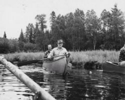 Leonard Urquhart and Wisconsin Conservation Department director Ernest F. Swift canoe the Flambeau River. 1952. Photo by Staber W. Reese. Courtesty of UW-Madison Digital Archives.