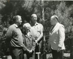 Dedication of red pine trees at Trees for Tomorrow in tribute to Fred Schmeeckle's (WCHF Inductee) years of service. L-R: Jim Newman, B. C. Schmeeckle, Bernard Wievel and Mully Taylor. 1967. (Photo by Don Hiller.)