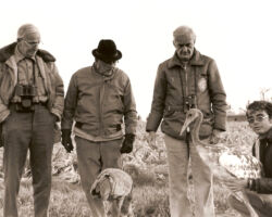 WCHF Inductee George Archibald (far right) hosting a tour at the International Crane Foundation, Baraboo, WI to 3 distinguished guests – Hickey, WCHF Inductee Owen Gromme, and Roger Tory Peterson. Circa early 1970s. (Photo courtesy of Susi Hickey Nehls.)