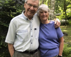 Arlen Christenson and wife, Judy, at their cabin in northern Wisconsin. Arlen's love for his family influenced his desire to pursue social and environmental justice for future generations. 2018. (Photo courtesy of Christenson family.)