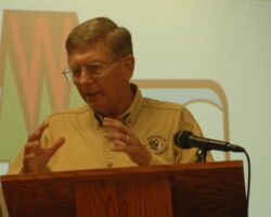 Meyer testifying on sportfishing in Lake Michigan, at a meeting of the Natural Resources Board, Madison, WI. 2011. (Photo courtesy of Tim Eisele.)