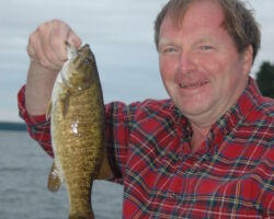 Craven loves to fish and is shown here fishing during an evening of free time at a Coverts Workshop at UW-Madison’s Kemp Natural Resources Station in Woodruff, WI. 2006. (Photo courtesy of Tim Eisele.)