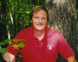 Craven at the first Coverts Workshop near Woodruff, WI. Craven started these workshops for woodland landowners in WI and is shown here on a walk with DNR wildlife and forest staff to see woodland management activities. 1994. (Photo courtesy of Tim Eisele.)