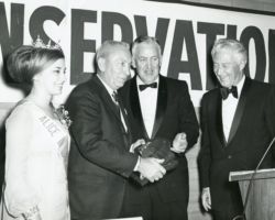 Governor Knowles (far right) looks on as Leo Nickash (2nd from left, WCHF Inductee) receives a Conservation Congress Award. (Photo courtesy of Wisconsin DNR.)