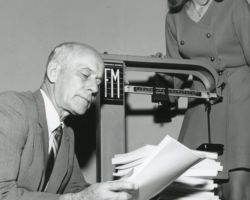 Walter Scott with testimony from DDT hearing. 1969. (Courtesy of Wisconsin DNR.)