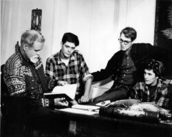 Frederick briefing "boomers." Over the years, several thousand people, referred to as "boomers," spent the night at the Hamerstrom house and went out in the wee hours of the morning to sit in a Prairie Chicken blind. (Photo courtesy of Elva Hamerstrom Paulson.)