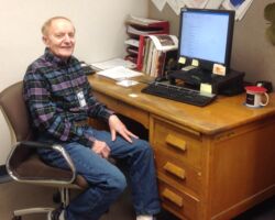 2020 At the desk in 2020. Desk is where a lot of unit-specific deer population monitoring took place over the years and where harvest quota guidelines were prepared. The war surplus desk was moved from Ladysmith to Black River Falls, to Rhinelander! (McCaffery photo)