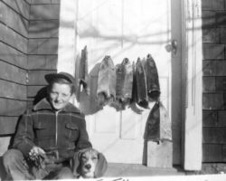 Keith with a catch of muskrats while in junior high school. Most were trapped around the "mill pond" (Chapman Lake) and flooded clay pits near the old brickyard. Tending traps was merely a short bike ride from our house. The family beagle had no role in trapping.