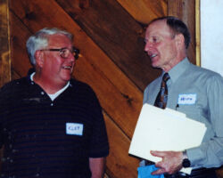 Keith discussing field research with Research Bureau Director Kent Klepinger after a statewide meeting in the 1980s. (DNR staff photo)